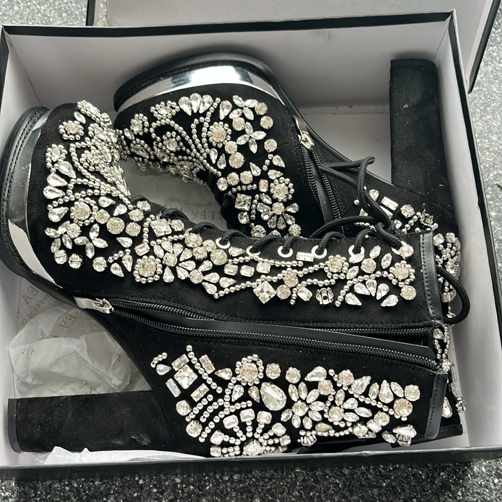 Ankle bedazzled heel boots.